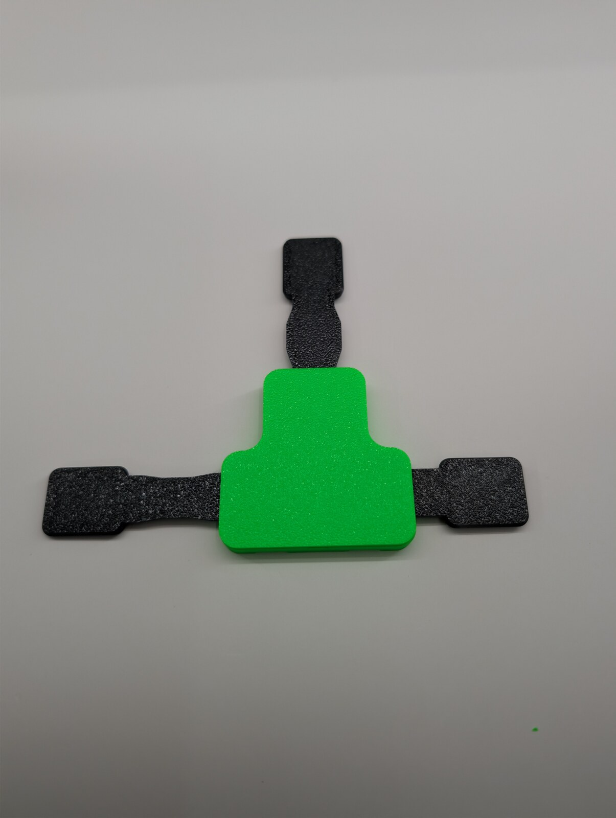 Real printed T joiner with cap seated over the straps.